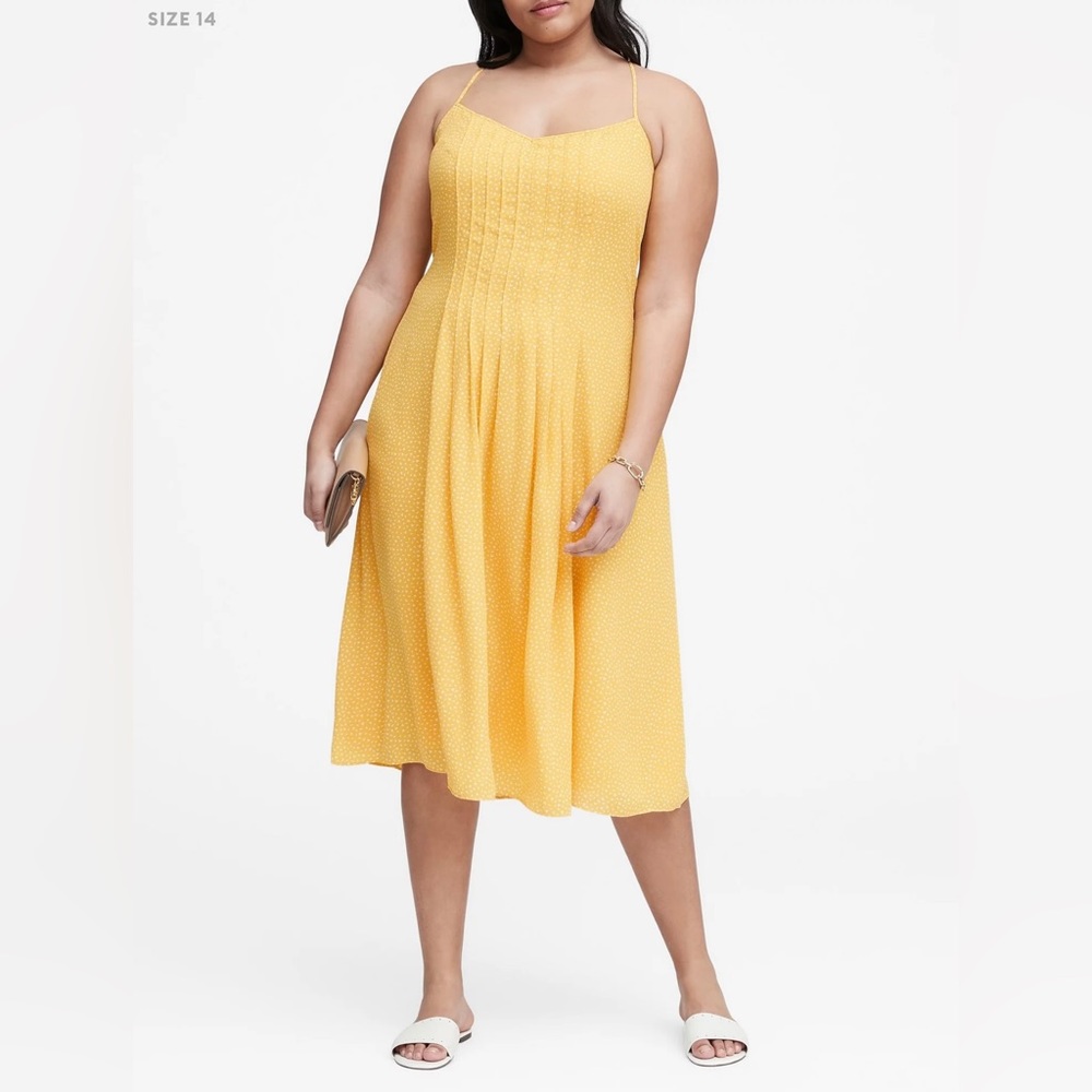 Banana Republic yellow midi dress. Straps cross in back.